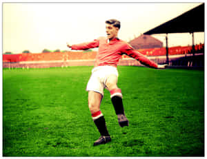 Caption: British Soccer Icon Duncan Edwards In Action Wallpaper