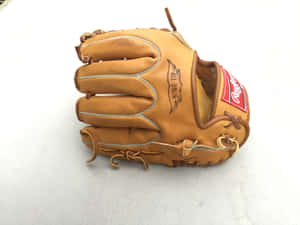 Caption: Captivating Close-up Of Baseball Gloves Wallpaper