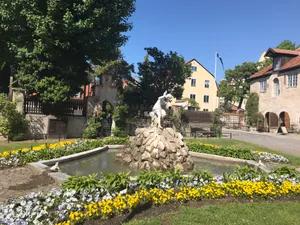 Caption: Captivating Sunset Over The Serene Visby Cityscape Wallpaper