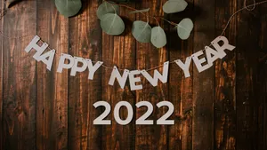 Caption: Celebrating New Year 2022 With Fireworks Display Wallpaper