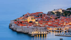 Caption: Charming Coastal Town In Croatia Wallpaper