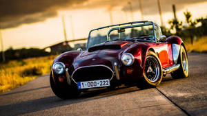 Caption: Classic Beauty - 1965 Shelby Cobra Wallpaper