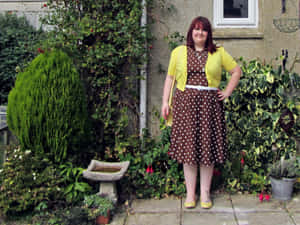 Caption: Classic Brown Polka Dot Background Wallpaper