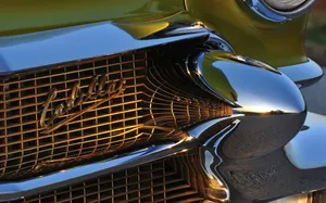 Caption: Classic Cadillac Deville - The Symbol Of Luxury And Style Wallpaper