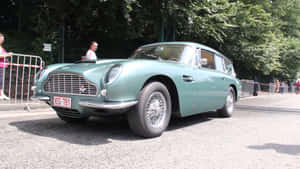 Caption: Classic Elegance: Aston Martin Db5 Wallpaper