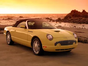 Caption: Classic Ford Thunderbird In Pristine Condition Wallpaper