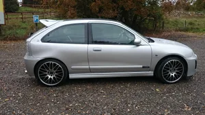 Caption: Classic Mg Zr In Superior Condition By The Sunset Wallpaper