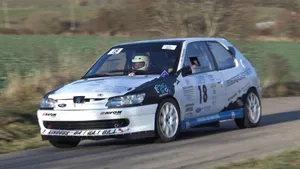 Caption: Classic Peugeot 306 In Pristine Condition Wallpaper