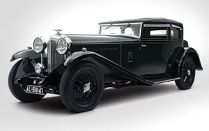 Caption: Classic Two-door Sedan Vintage Car Wallpaper