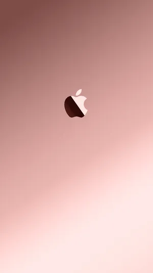 Caption: Closeup Of A Rose Gold Iphone Wallpaper