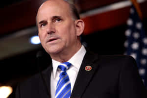 Caption: Congressman Louie Gohmert In A Low-angle Shot Wallpaper