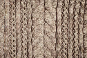 Caption: Cozy Knitted Wool Texture Wallpaper