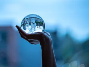 Caption: Crystal Ball Reflecting A Dreamy Landscape Wallpaper