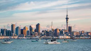 Caption: Dazzling Dawn Over Auckland City Skyline Wallpaper