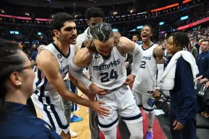 Caption: Dillon Brooks In Action On The Basketball Court Wallpaper