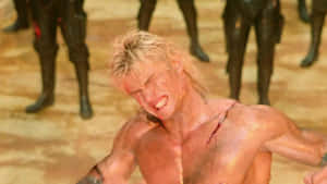 Caption: Dolph Lundgren: A Legendary Icon In Action Movies Wallpaper