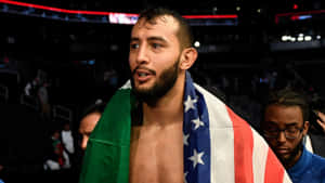 Caption: Dominick Reyes In An Intense Workout Session. Wallpaper