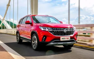 Caption: Dongfeng Vehicle Lineup On Display At An Exhibition Wallpaper