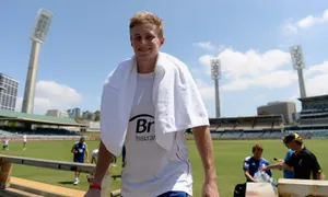 Caption: Dynamic Joe Root Playing Shot At Cricket Stadium Wallpaper