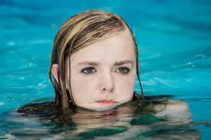 Caption: Eighth Grade Student Studying With Concentration Wallpaper