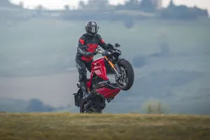 Caption: Electrifying Speed: Energica Unleashed Wallpaper