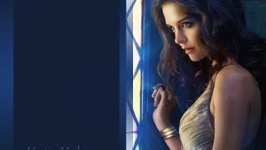 Caption: Elegant American Actress Katie Holmes In Profile Shot Wallpaper