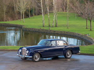 Caption: Elegant Bentley S2 Classic Luxury Car Wallpaper