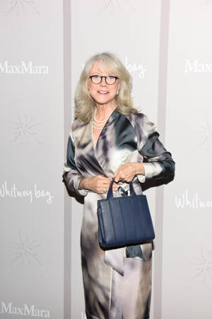 Caption: Elegant Blythe Danner In A Marble Dress Wallpaper