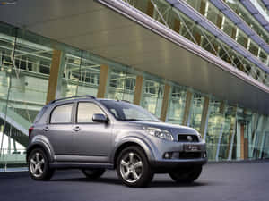 Caption: Elegant Daihatsu Terios In Natural Environment Wallpaper