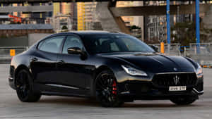 Caption: Elegant Maserati Quattroporte In Full Glory Wallpaper