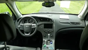 Caption: Elegant Saab 9-4x Cruising On A Highway Wallpaper