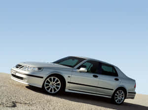 Caption: Elegant Saab 9-5 In Motion Wallpaper