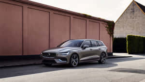 Caption: Elegant Volvo V60 In Motion Wallpaper