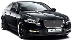 Caption: Elite Luxury - Jaguar Xj In Monochrome Wallpaper