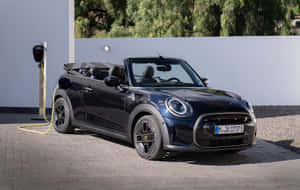 Caption: Enjoy The Open Road In A Mini Cooper S Convertible Wallpaper