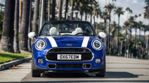 Caption: Enjoy The Ultimate Open-air Adventure In A Mini Cooper S Convertible Wallpaper