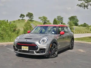 Caption: Experience The Stylish And Versatile Mini Cooper S Clubman All4 Wallpaper