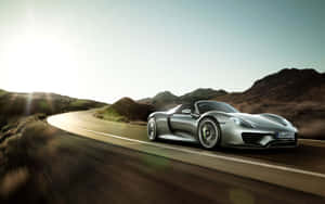 Caption: Exquisite Porsche 918 Spyder For A Luxurious Ride Wallpaper