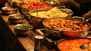 Caption: Extravagant Feast Of Indian Cuisine Wallpaper