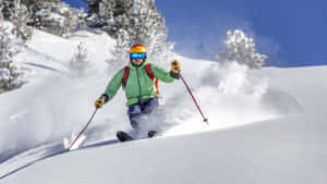 Caption: Fearless Snowboarder Descending Mountain Slopes Wallpaper