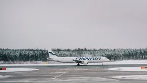 Caption: Finnair Aircraft Ready For Departure On Tarmac Wallpaper