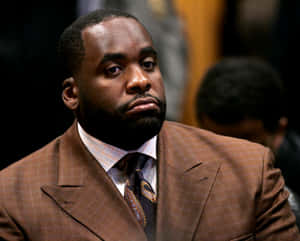 Caption: Former Mayor Kwame Kilpatrick Delivering A Powerful Speech Wallpaper