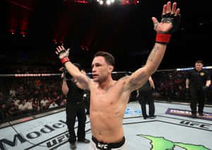 Caption: Frankie Edgar Delivering A Winning Strike Against Cub Swanson Wallpaper