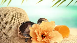 Caption: Fun And Colorful Beach Accessories Awaiting Your Next Adventure Wallpaper