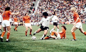 Caption: Gerd Muller In Action During The Match Between Germany And Netherlands Wallpaper