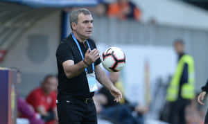 Caption: Gheorghe Hagi Coaching Viitorul Constanta Team At A Match Wallpaper