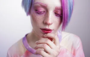 Caption: Girl Wearing Cute Makeup And Accessories Wallpaper