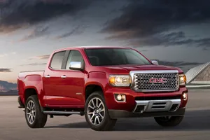 Caption: Gmc Canyon - Bold And Versatile Pick-up Truck Wallpaper