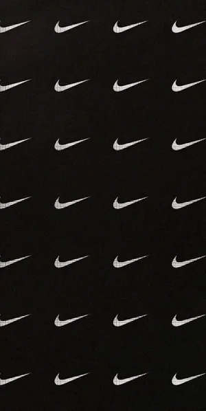 Caption: Iconic Black Nike Sneakers Wallpaper