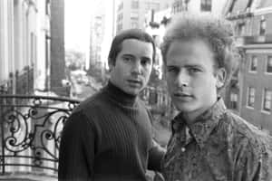 Caption: Iconic Music Duo Simon And Garfunkel Wallpaper